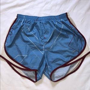 Blue and maroon Nike running shorts
